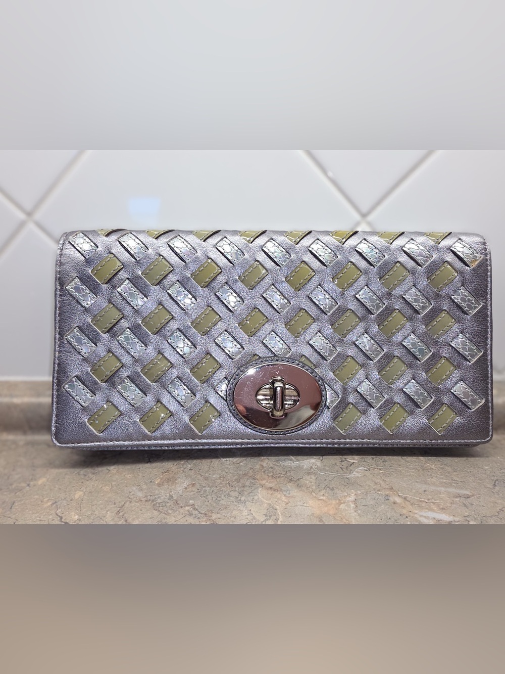 Coach Silver Woven Clutch with Olive Insets